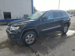 Salvage cars for sale from Copart Orlando, FL: 2012 Jeep Grand Cherokee Laredo