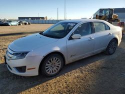 Salvage cars for sale from Copart Nisku, AB: 2011 Ford Fusion Hybrid