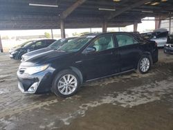 Toyota Camry Hybrid salvage cars for sale: 2014 Toyota Camry Hybrid