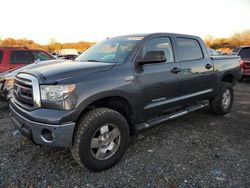 Salvage SUVs for sale at auction: 2011 Toyota Tundra Crewmax SR5