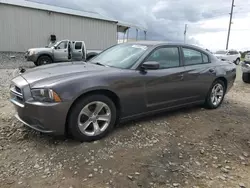 Carros dañados por inundaciones a la venta en subasta: 2014 Dodge Charger SE