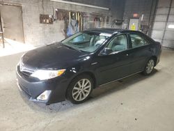 Salvage cars for sale from Copart Angola, NY: 2012 Toyota Camry Hybrid