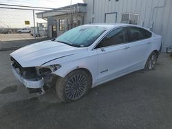 Salvage cars for sale from Copart Bakersfield, CA: 2017 Ford Fusion SE Hybrid