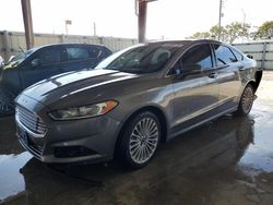 Salvage cars for sale from Copart Homestead, FL: 2014 Ford Fusion Titanium HEV