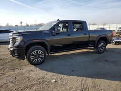 Carros dañados por inundaciones a la venta en subasta: 2023 GMC Sierra K2500 AT4