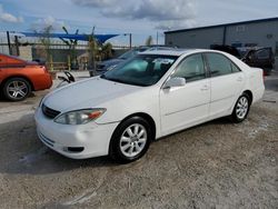 Carros dañados por inundaciones a la venta en subasta: 2004 Toyota Camry LE