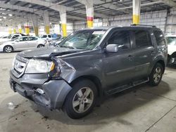 Salvage cars for sale from Copart Woodburn, OR: 2011 Honda Pilot EXL