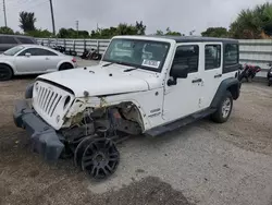 Vehiculos salvage en venta de Copart Miami, FL: 2014 Jeep Wrangler Unlimited Sport