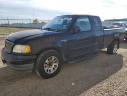 Salvage cars for sale from Copart Houston, TX: 2002 Ford F150