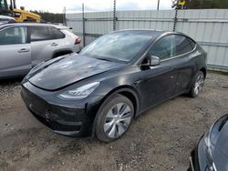 Carros dañados por inundaciones a la venta en subasta: 2023 Tesla Model Y