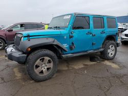 2011 Jeep Wrangler Unlimited Sahara en venta en Woodhaven, MI