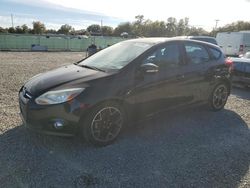 Salvage cars for sale from Copart Riverview, FL: 2014 Ford Focus SE