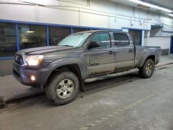 Salvage cars for sale from Copart Pasco, WA: 2014 Toyota Tacoma Double Cab Long BED