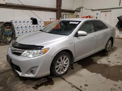 Salvage cars for sale at Nisku, AB auction: 2014 Toyota Camry Hybrid