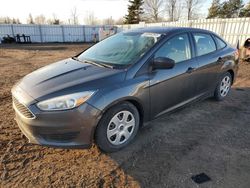 Salvage cars for sale from Copart Bowmanville, ON: 2015 Ford Focus S