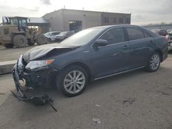 Salvage cars for sale from Copart Kansas City, KS: 2012 Toyota Camry Hybrid