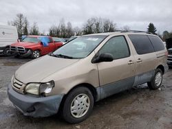 Salvage cars for sale from Copart Portland, OR: 2001 Toyota Sienna LE