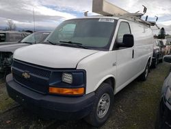 Salvage trucks for sale at Woodburn, OR auction: 2015 Chevrolet Express G2500
