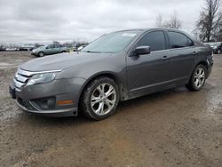 Salvage cars for sale from Copart Ontario Auction, ON: 2012 Ford Fusion SE
