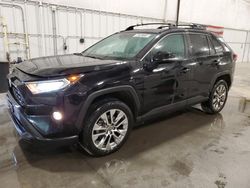 Salvage cars for sale from Copart Avon, MN: 2021 Toyota Rav4 XLE Premium