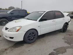 Salvage cars for sale at Orlando, FL auction: 2004 Mitsubishi Lancer ES