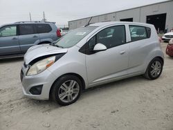 Salvage cars for sale at Jacksonville, FL auction: 2014 Chevrolet Spark 1LT