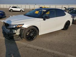 Salvage cars for sale at Fresno, CA auction: 2021 Toyota Camry XSE