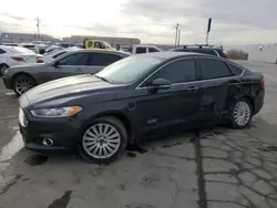 Salvage cars for sale at Magna, UT auction: 2014 Ford Fusion Titanium Phev