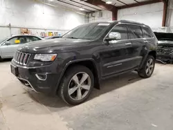 Jeep salvage cars for sale: 2014 Jeep Grand Cherokee Overland