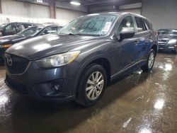 Salvage cars for sale at auction: 2014 Mazda CX-5 Touring