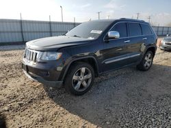 Salvage SUVs for sale at auction: 2013 Jeep Grand Cherokee Overland