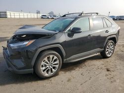 Salvage cars for sale at Fresno, CA auction: 2023 Toyota Rav4 XLE Premium