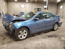 Salvage cars for sale from Copart Blaine, MN: 2009 Ford Fusion SE