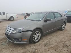 Salvage cars for sale at Houston, TX auction: 2012 Ford Fusion SE