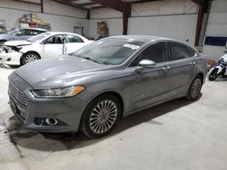 Salvage cars for sale at Chambersburg, PA auction: 2014 Ford Fusion Titanium HEV