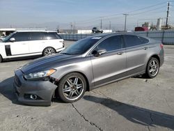 Salvage cars for sale at Sun Valley, CA auction: 2013 Ford Fusion Titanium