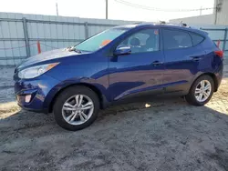 Salvage cars for sale at Jacksonville, FL auction: 2013 Hyundai Tucson GLS