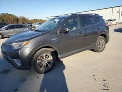 Salvage SUVs for sale at auction: 2016 Toyota Rav4 HV XLE