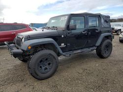 Jeep salvage cars for sale: 2011 Jeep Wrangler Unlimited Sport