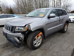 Salvage SUVs for sale at auction: 2015 Jeep Grand Cherokee Laredo