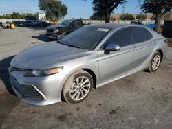 Salvage cars for sale from Copart Orlando, FL: 2022 Toyota Camry LE