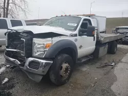 Salvage trucks for sale at Dyer, IN auction: 2012 Ford F550 Super Duty