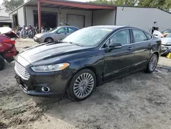 Salvage cars for sale at Seaford, DE auction: 2014 Ford Fusion Titanium