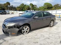 Salvage cars for sale at Fort Pierce, FL auction: 2012 Ford Fusion SE