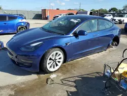 Salvage cars for sale at Homestead, FL auction: 2022 Tesla Model 3