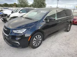 Chrysler Pacifica Hybrid Touring l salvage cars for sale: 2023 Chrysler Pacifica Hybrid Touring L