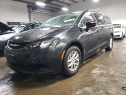 Salvage cars for sale at Elgin, IL auction: 2021 Chrysler Voyager LXI