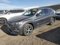 Salvage cars for sale at auction: 2018 BMW X1 XDRIVE28I