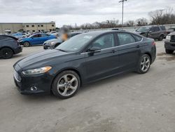 Salvage cars for sale from Copart Wilmer, TX: 2014 Ford Fusion SE