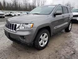 Salvage cars for sale at Leroy, NY auction: 2011 Jeep Grand Cherokee Laredo